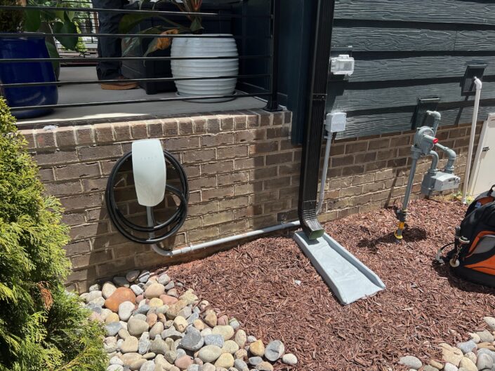 Tesla EV charger installed outside
