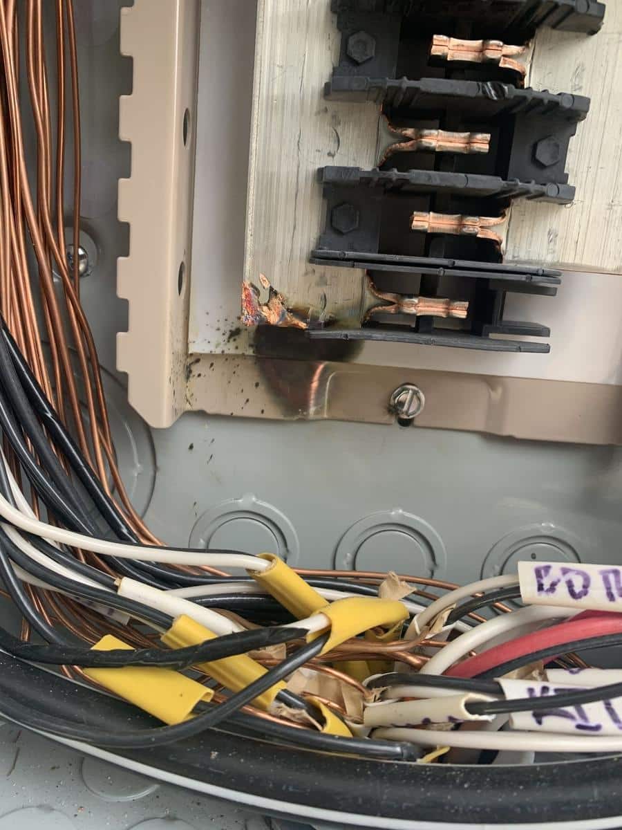 Heat damage at the bus connections inside an electrical panel