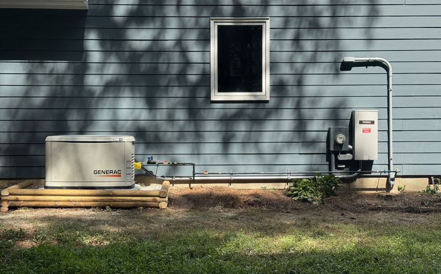 Generac standby generator installed beside a home by ARC Electric