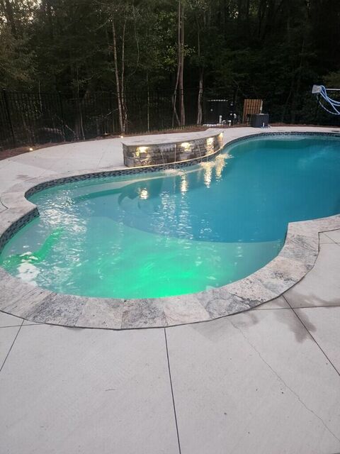 Pool and patio lighting at night