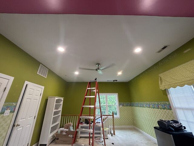 Recessed lights on a vaulted bedroom ceiling