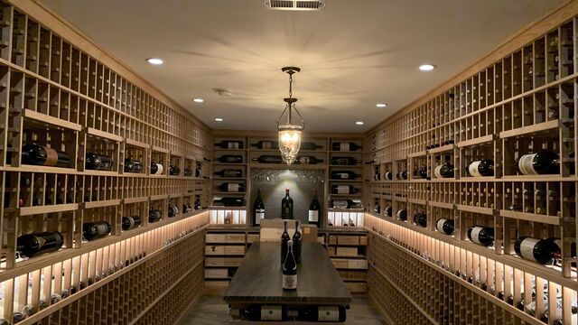 LED shelf lighting running the length of a wine cellar